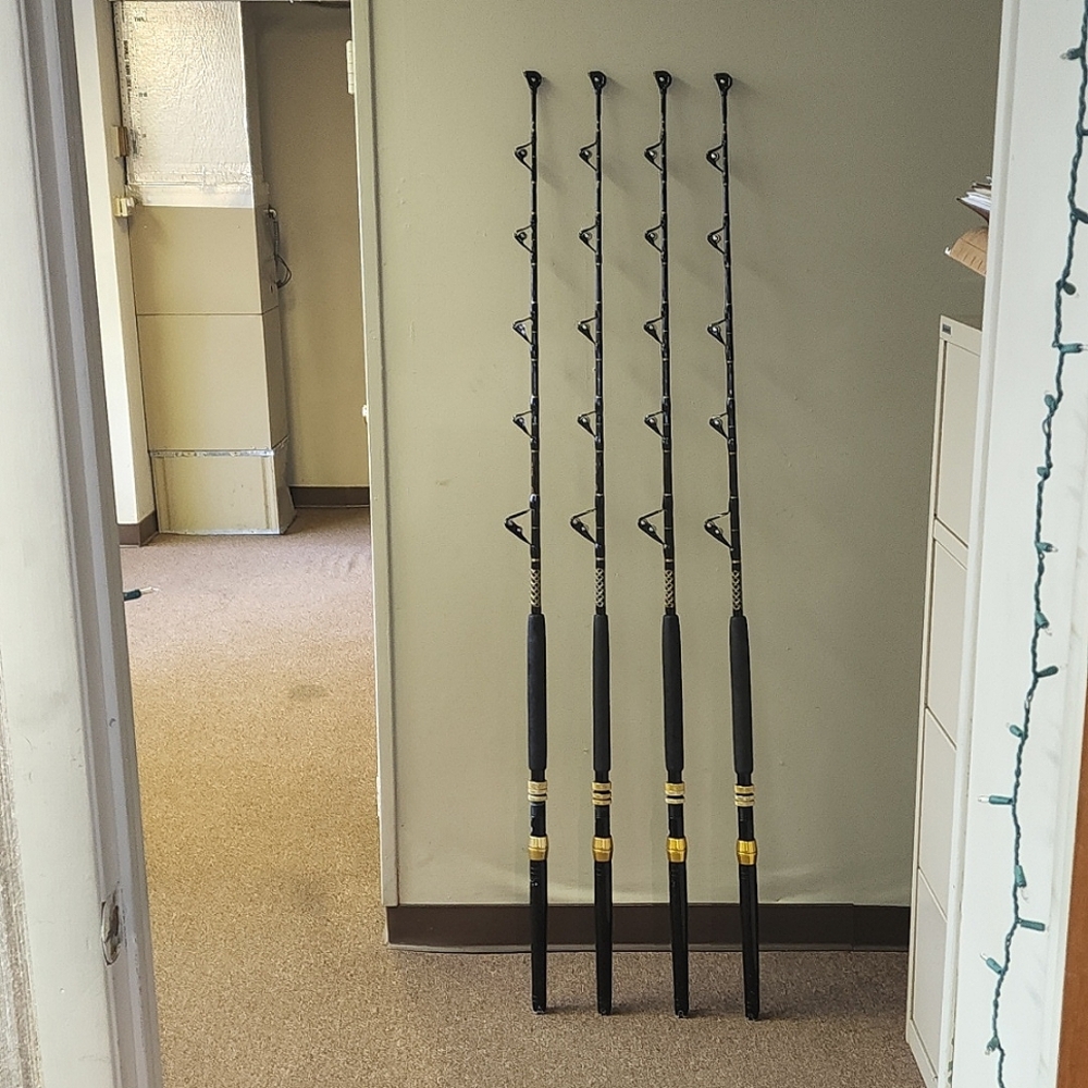 Four (4) Crook and Crook trolling rods with aftco butt and roller guides